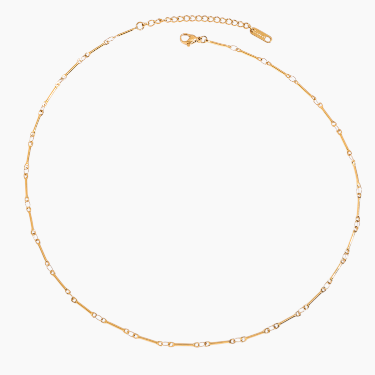 Gold chain necklace on a white background