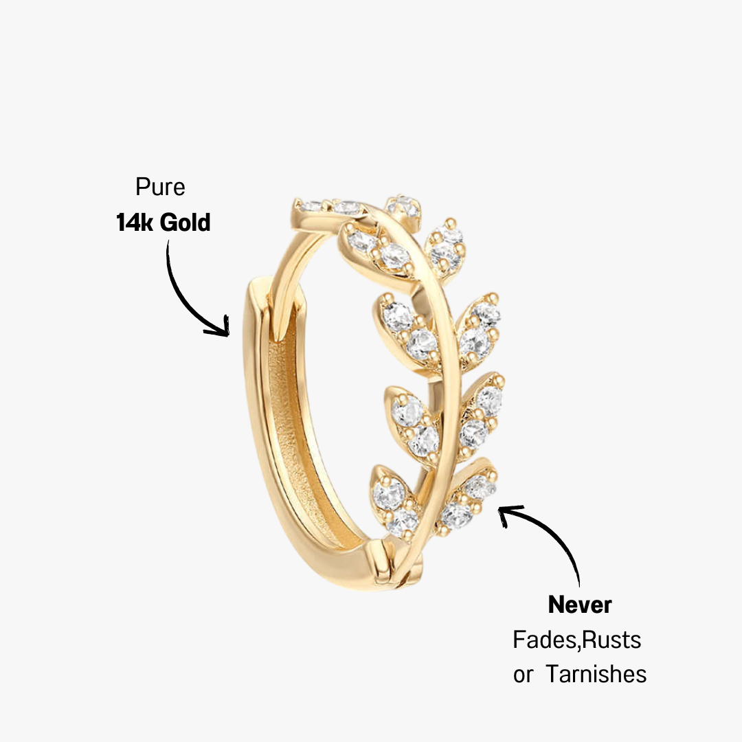 14K gold hoop earring featuring sparkling zirconia leaves