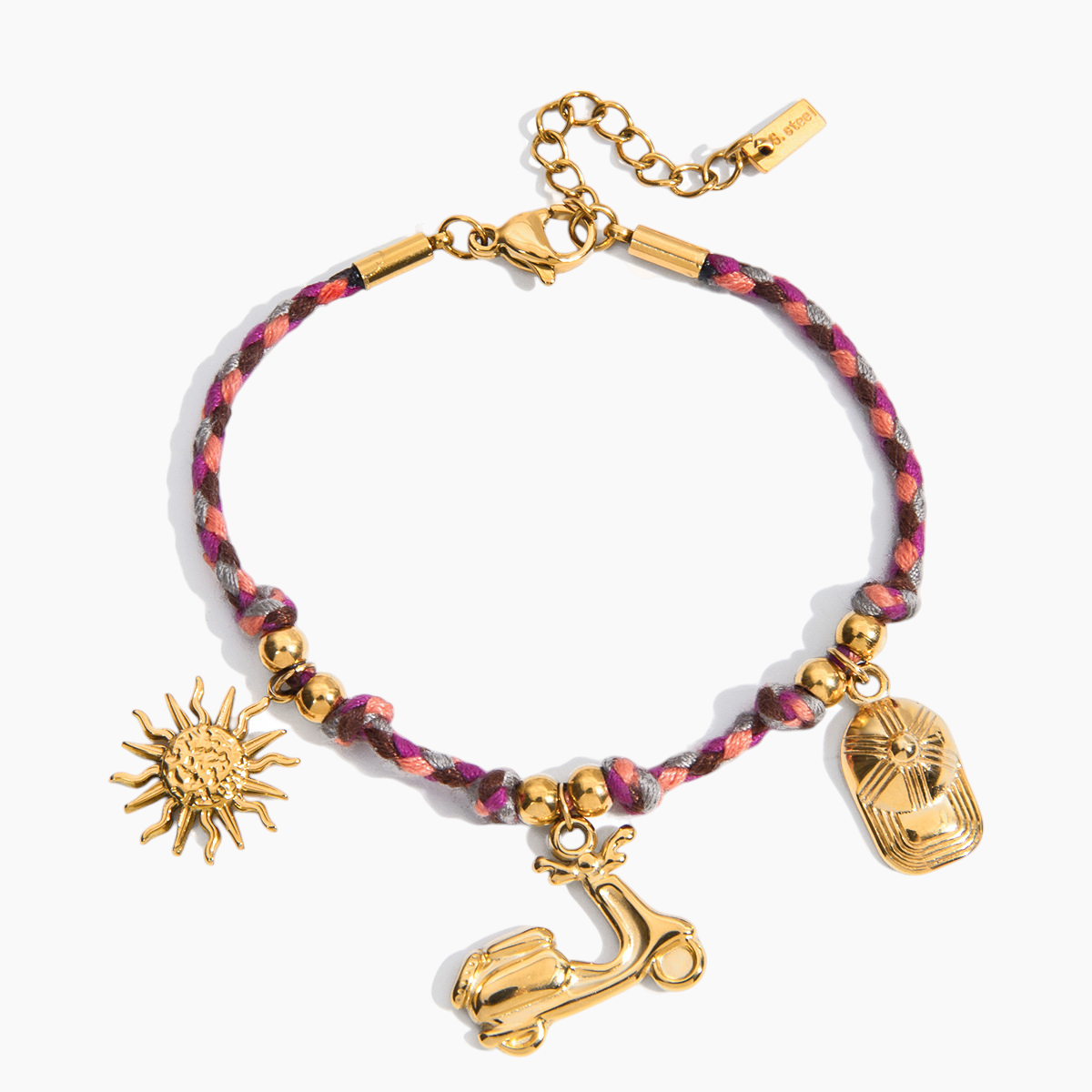 Bracelet with colorful cord and gold charms including a sun, scooter, and heart on a white background