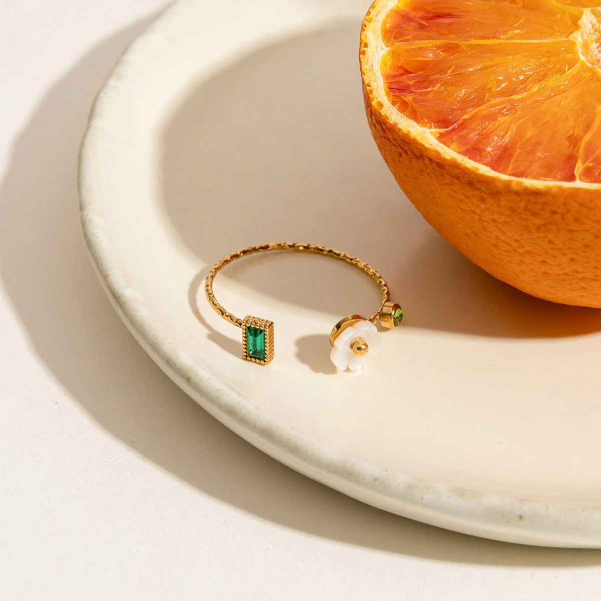 Summer rings styled with orange slice and natural light
