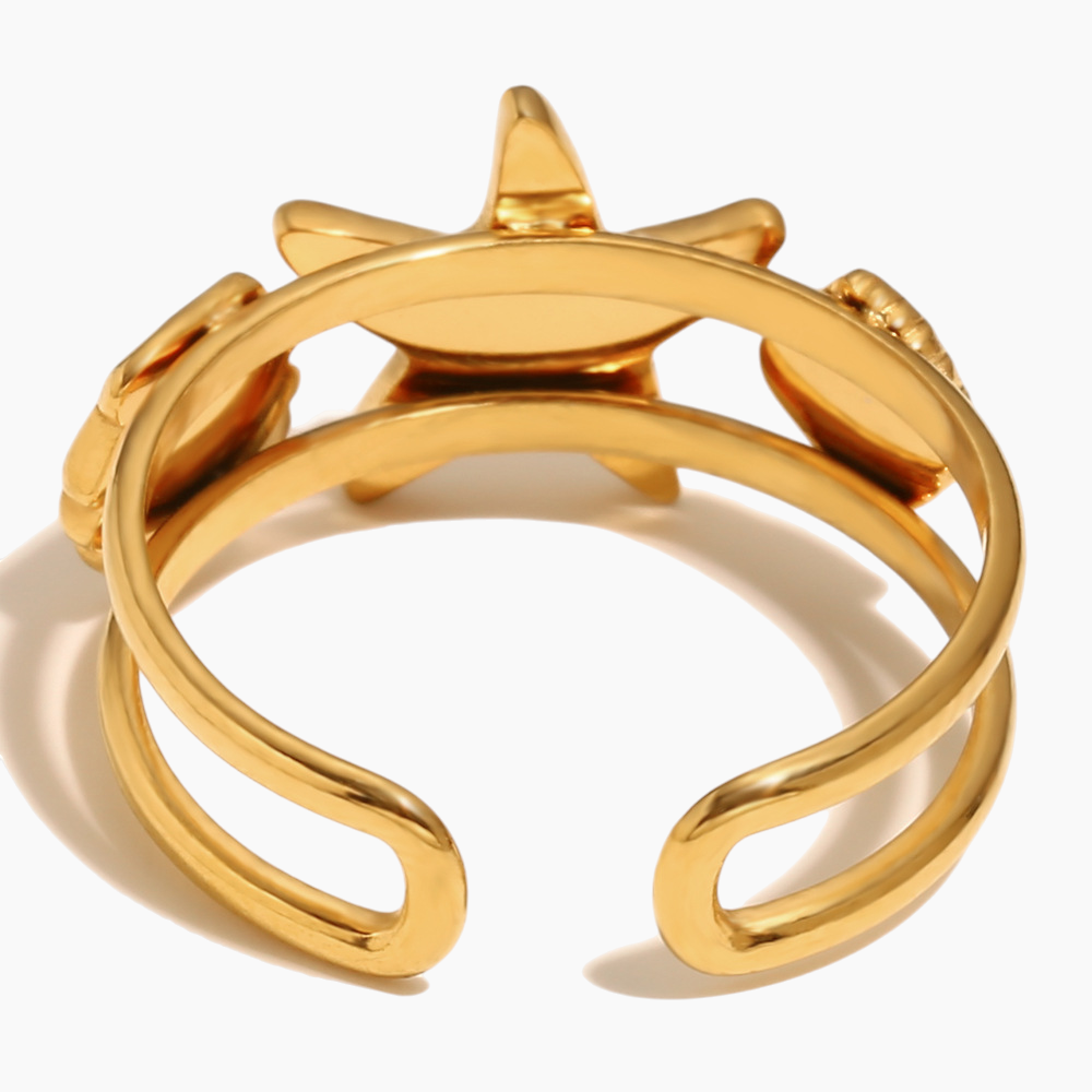 Starfish statement ring paired with layered beach jewelry