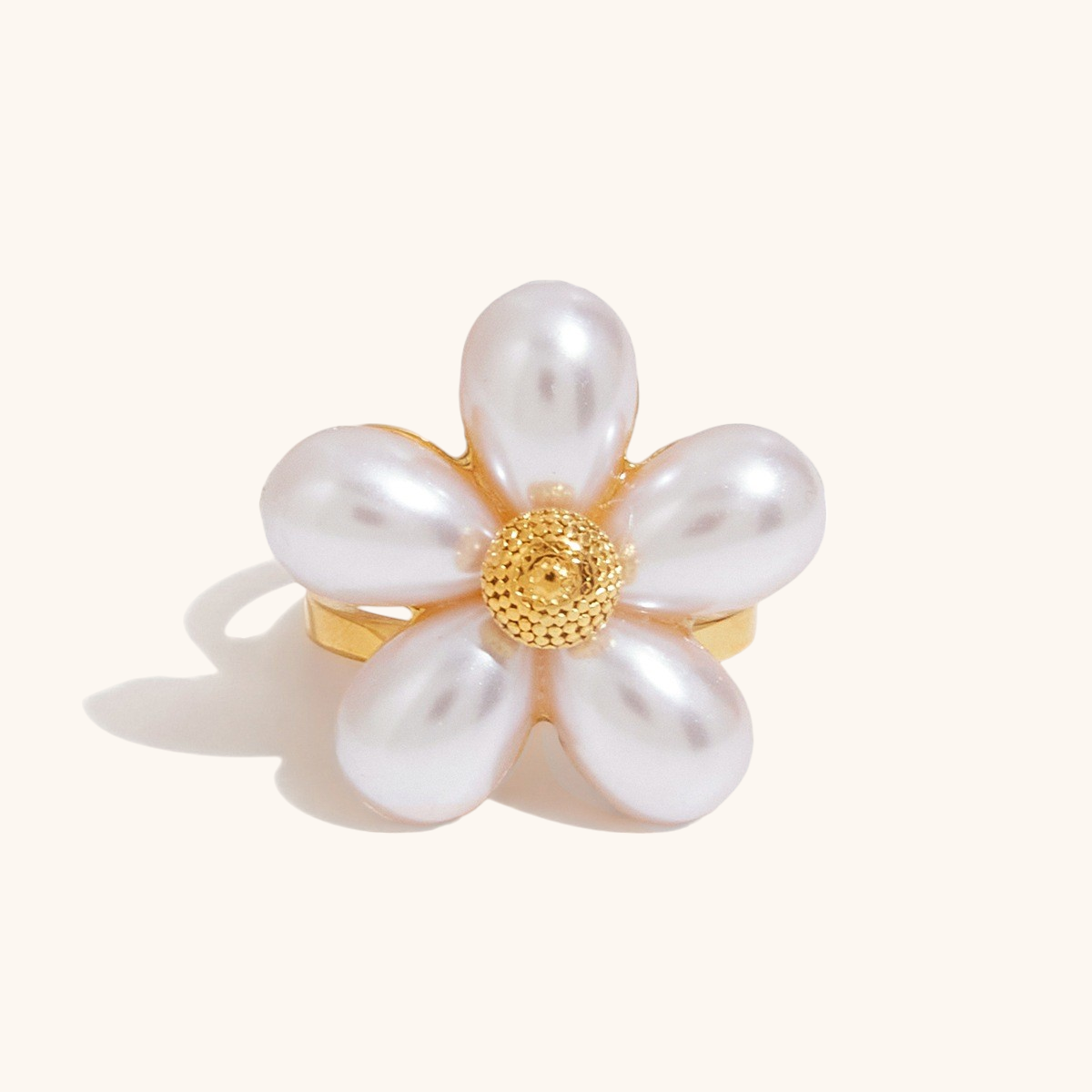 Adjustable flower ring with six pearl petals and gold center detail