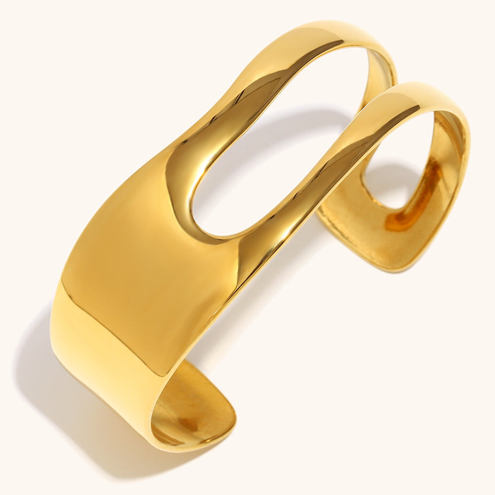 Minimalist gold open cuff bracelet for women with smooth high-shine finish