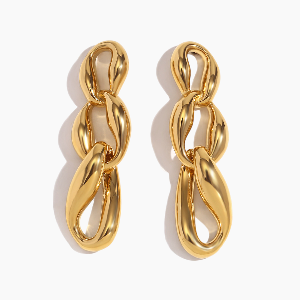 Pair of gold chain-style earrings on a white background