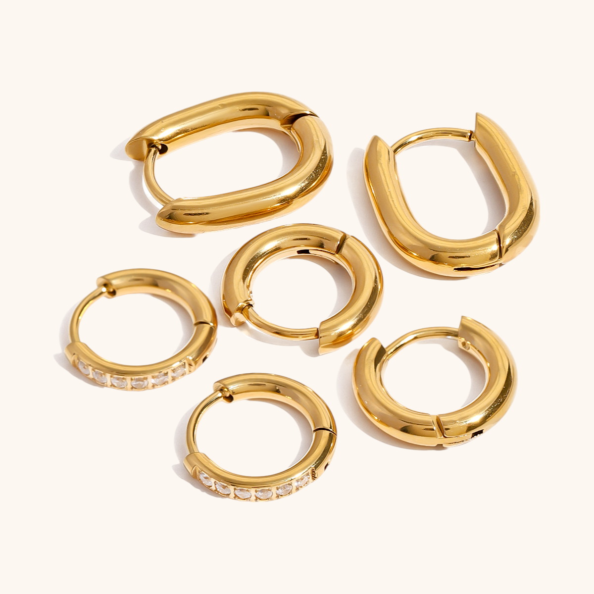 Gold oval chunky hoop earrings for daily wear