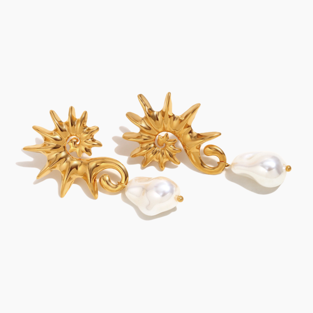 Coastal charm pearl earrings paired with layered necklaces