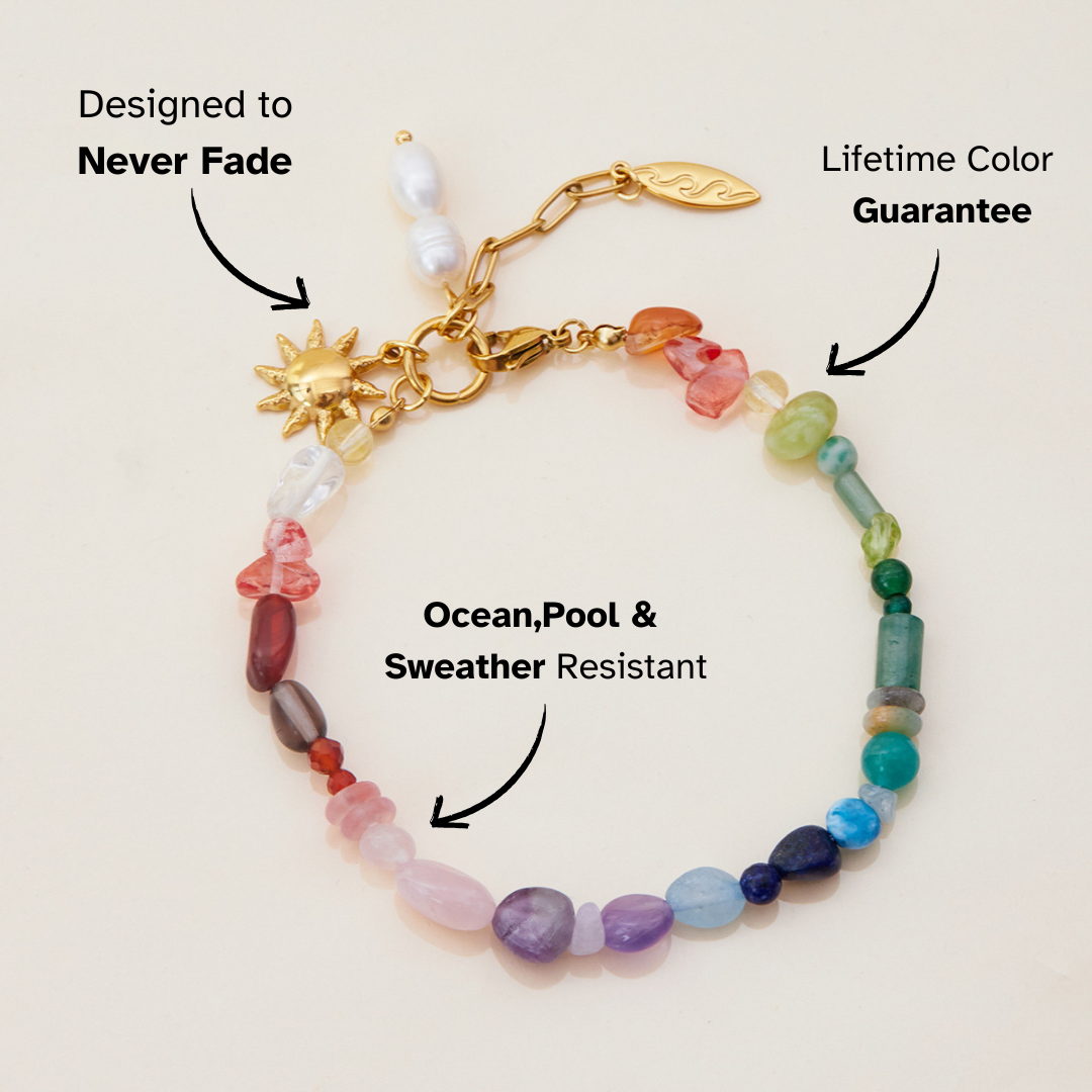 Close-up of multicolor crystal beads with adjustable gold clasp details