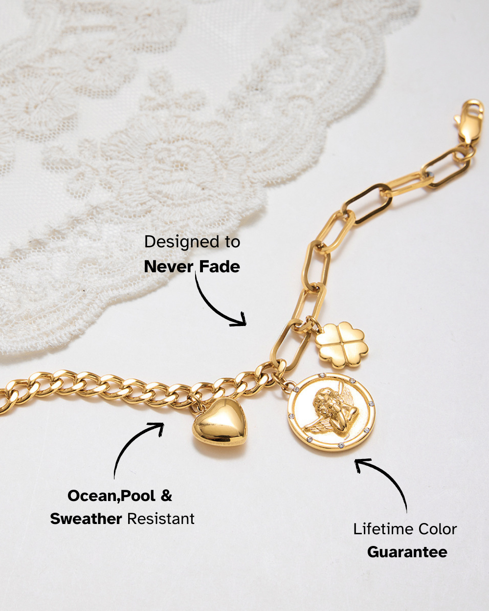 Gold bracelet with charms on a white background