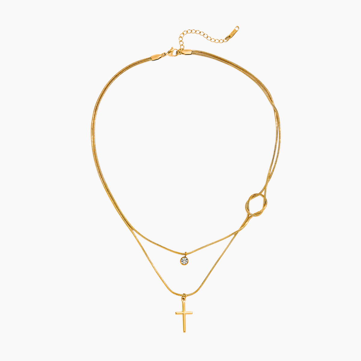 Gold necklace with two pendants on a white background