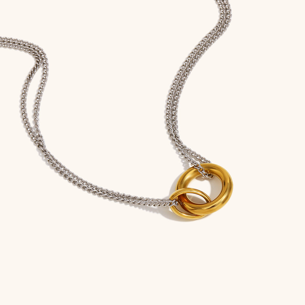 Interlocking gold hoop on silver double chain necklace