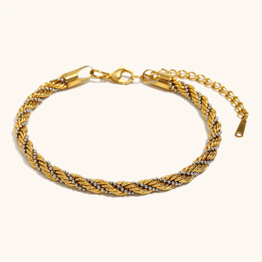 Gold and silver rope twist bracelet close-up