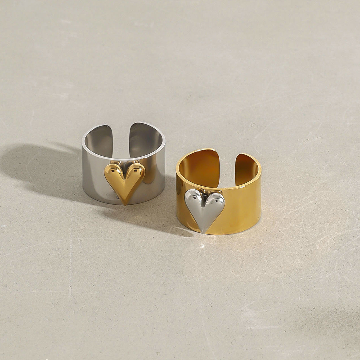 Stylish heart design open ring placed on nature background