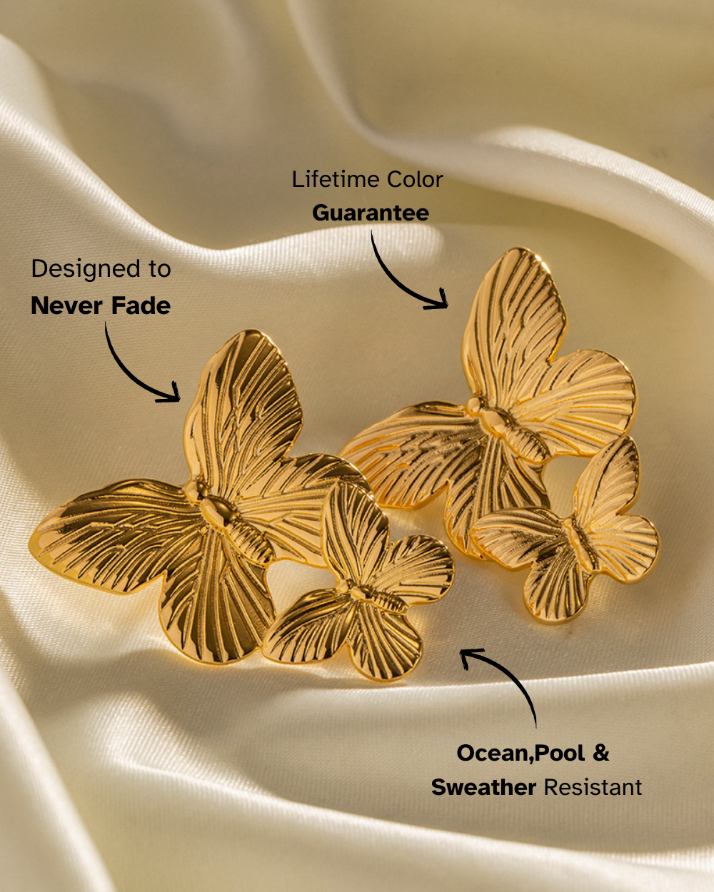 Gold butterfly-shaped earrings on a beige fabric background with text highlighting features.