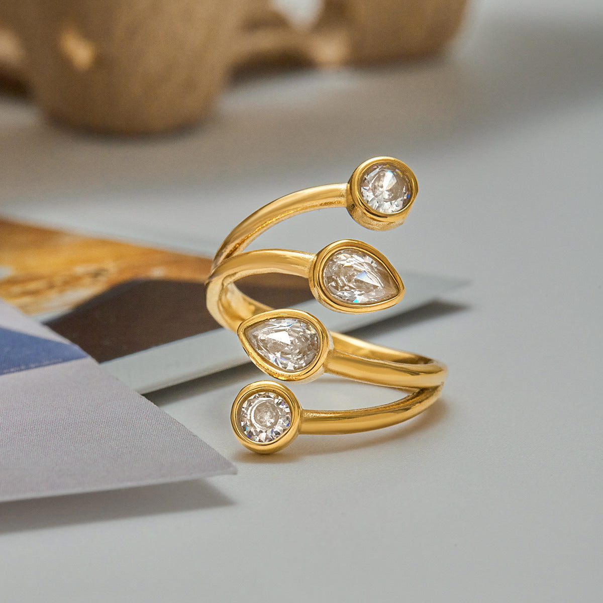 Close-up of adjustable open ring with sparkling clear stones
