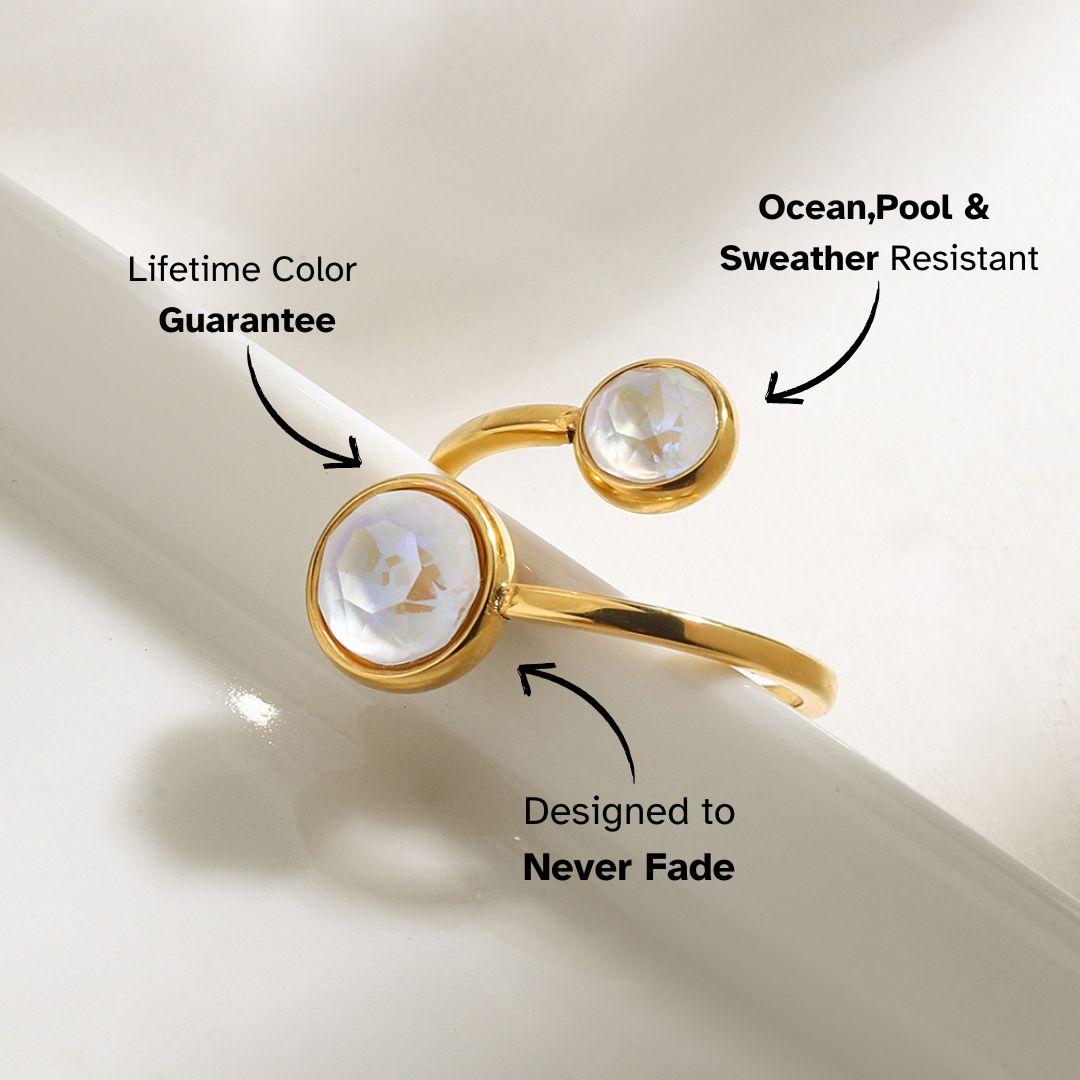 Minimalist gold wrap ring featuring dual clear gemstones, ideal for stacking