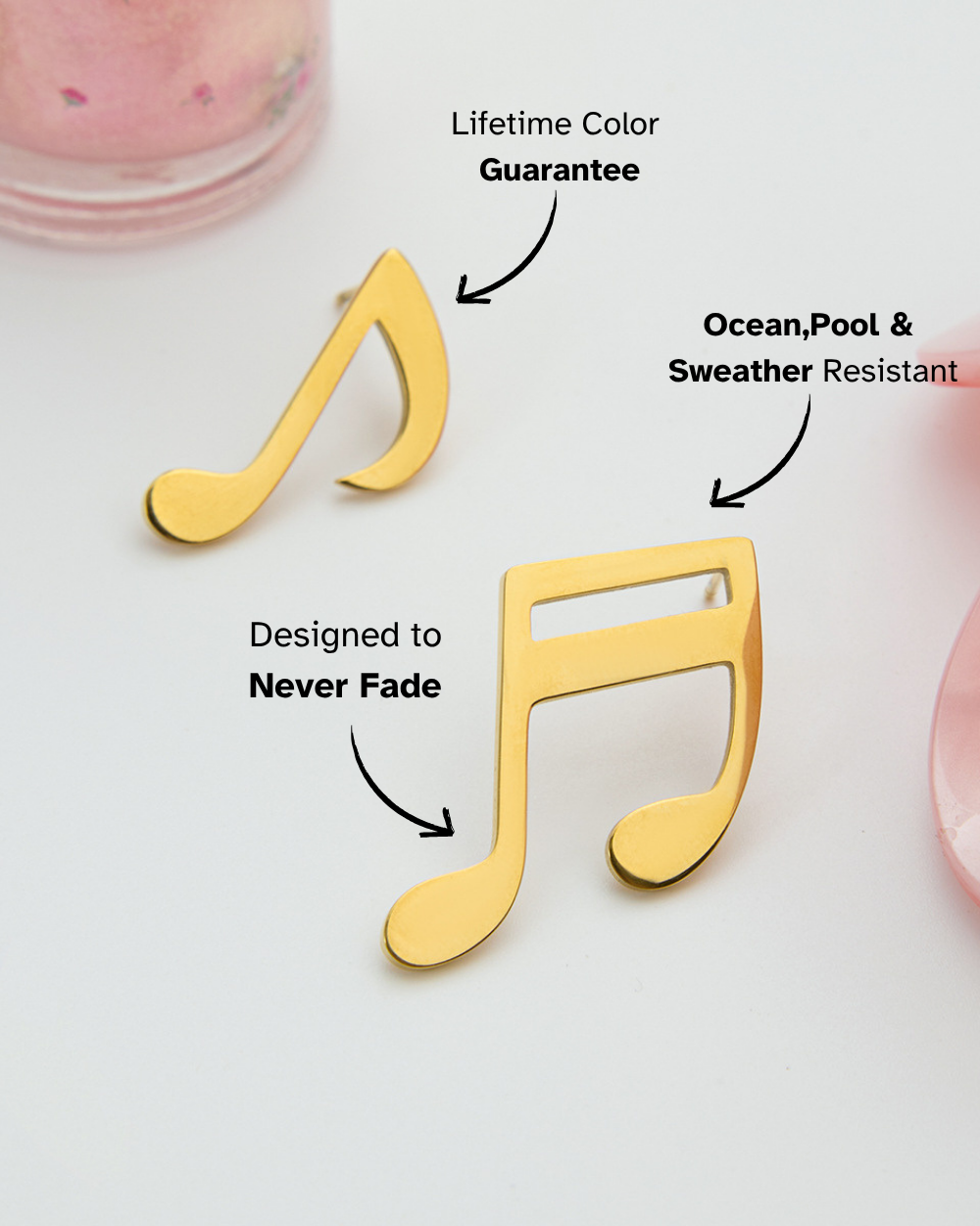 Gold music note earrings on a light background with text about color guarantee, resistance to weather, and fade resistance.