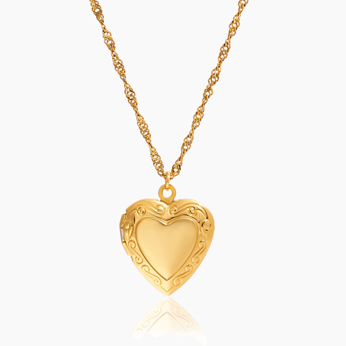 Gold heart-shaped necklace on a white background