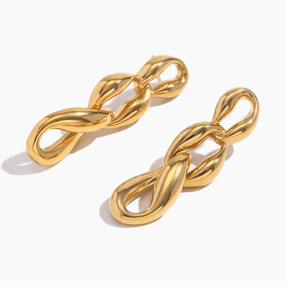 Pair of gold chain earrings on a white background