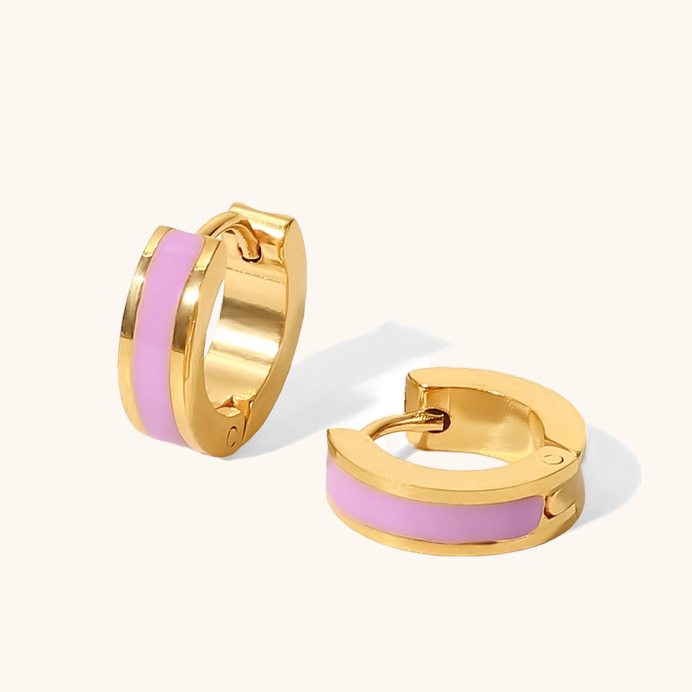 Pink GlowPop hoop earrings styled on white background
