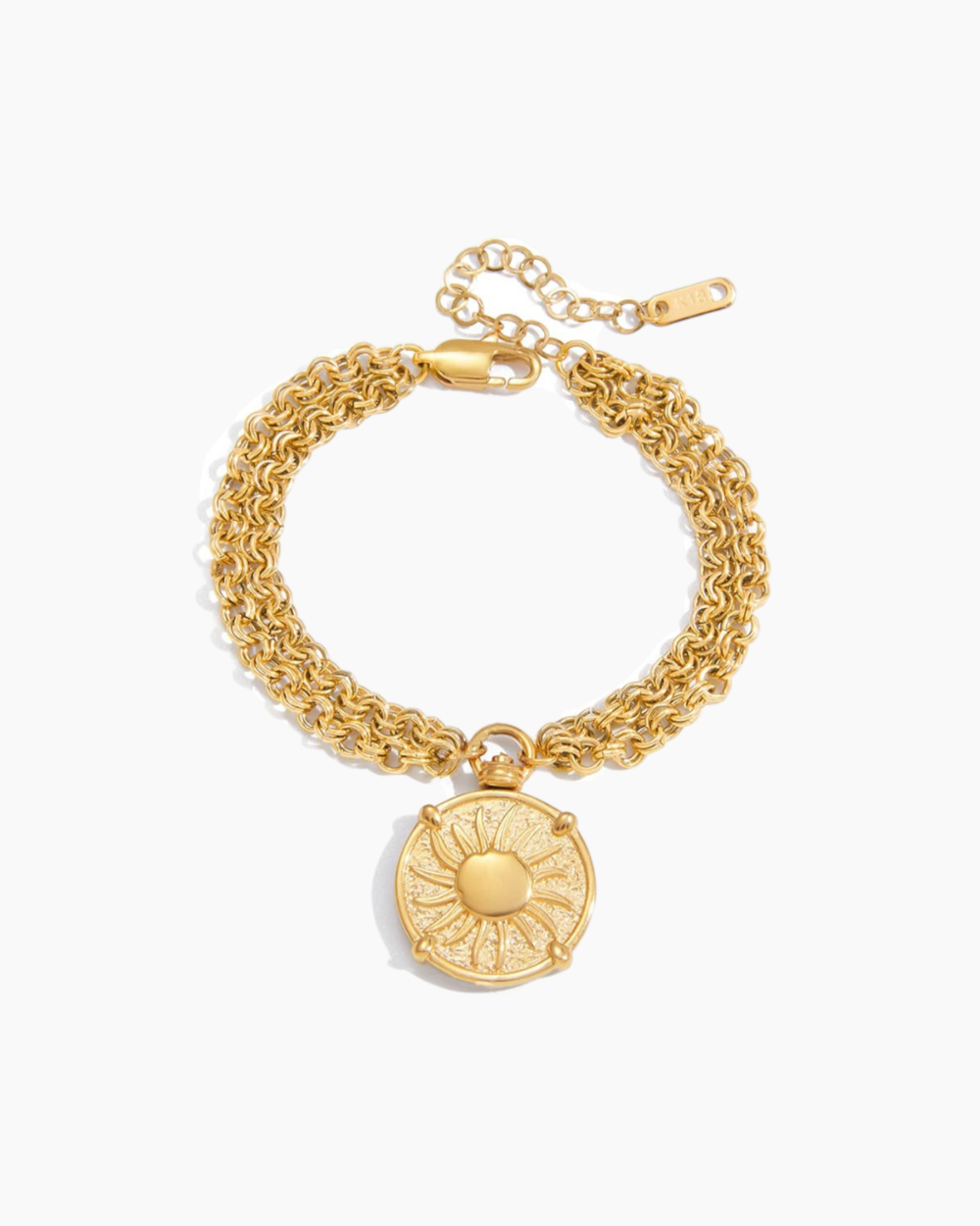 Gold bracelet with a circular pendant on a white background