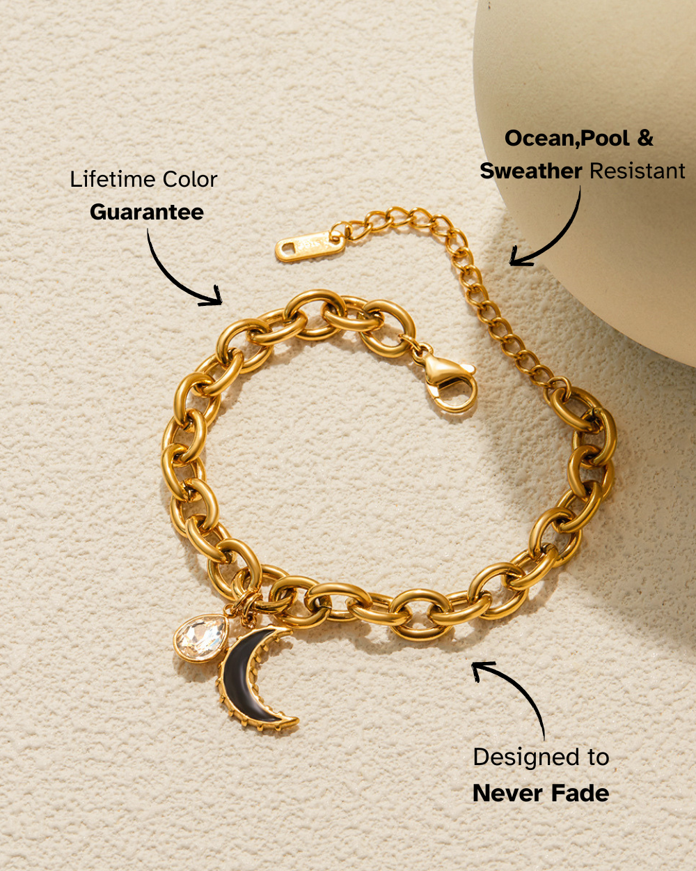 Gold chain bracelet with a moon charm on a beige background, featuring text about product features.