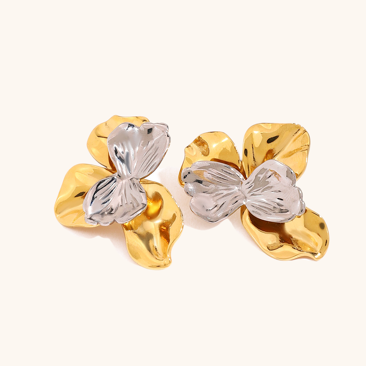 Mixed metal flower-shaped earrings with gold and silver petals