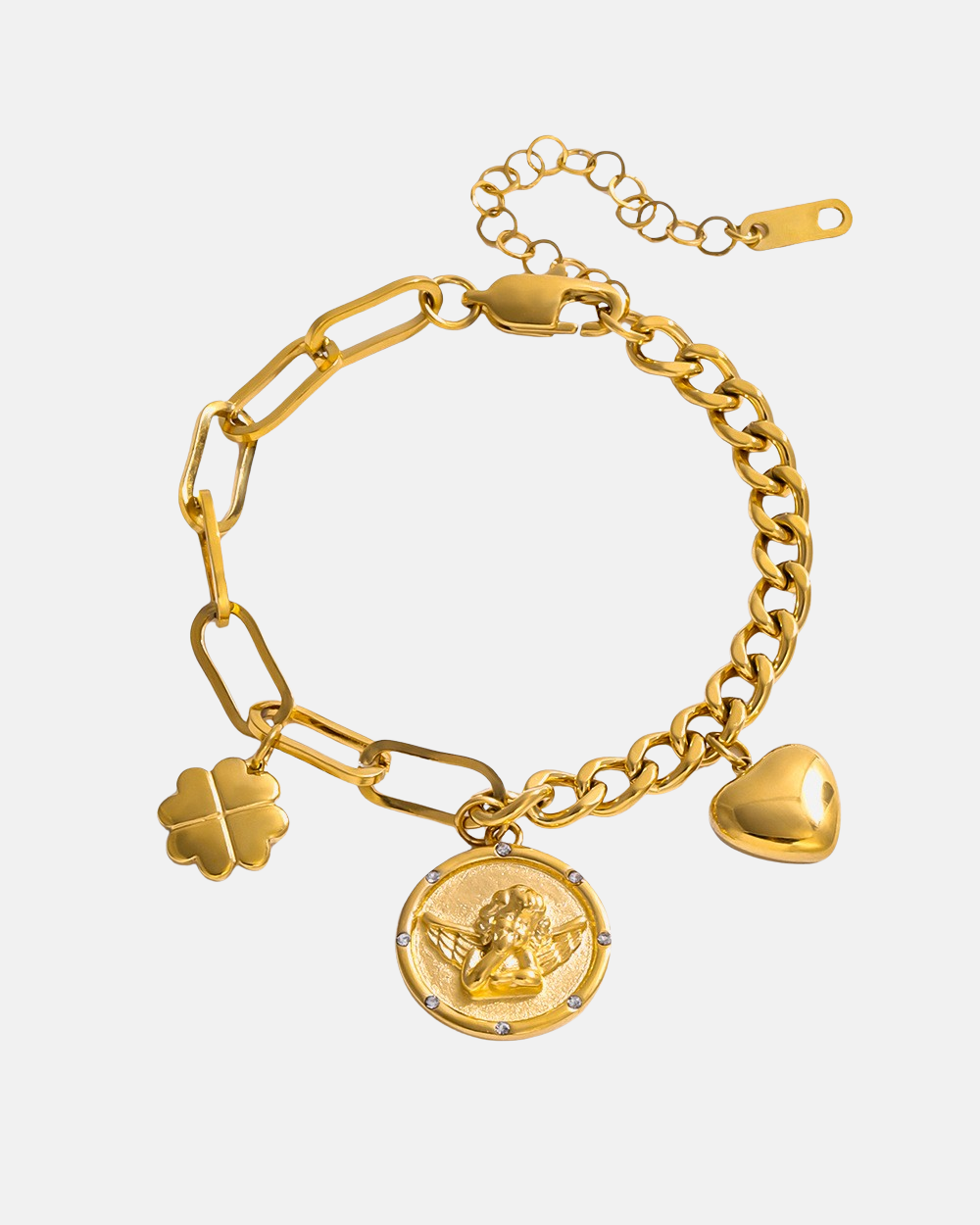 Gold bracelet with charms on a light beige background