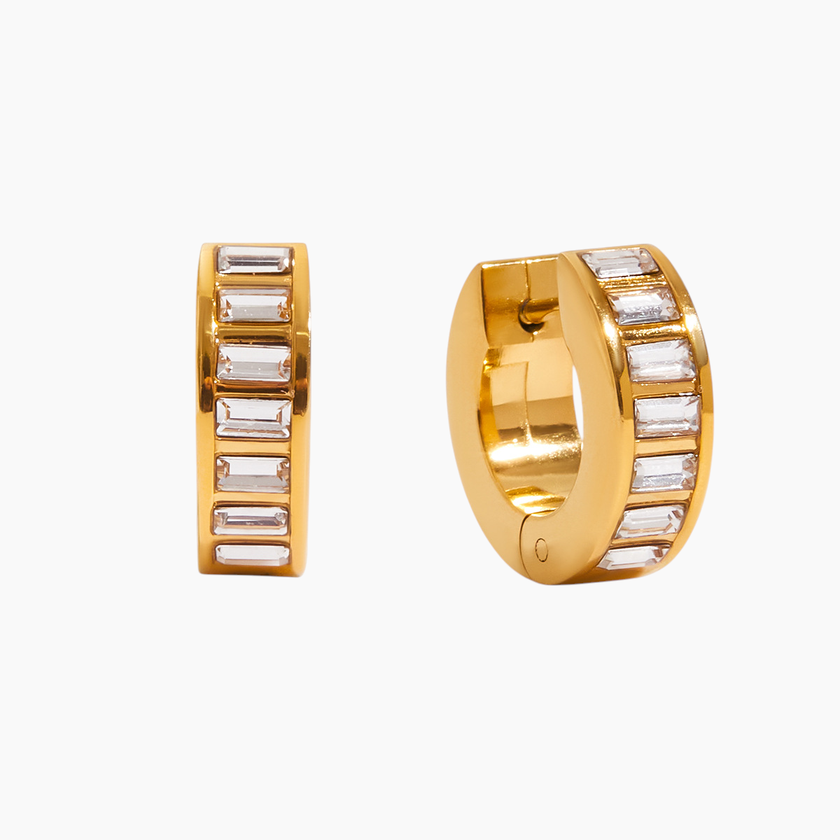 Gold hoop earrings with embedded stones on a white background