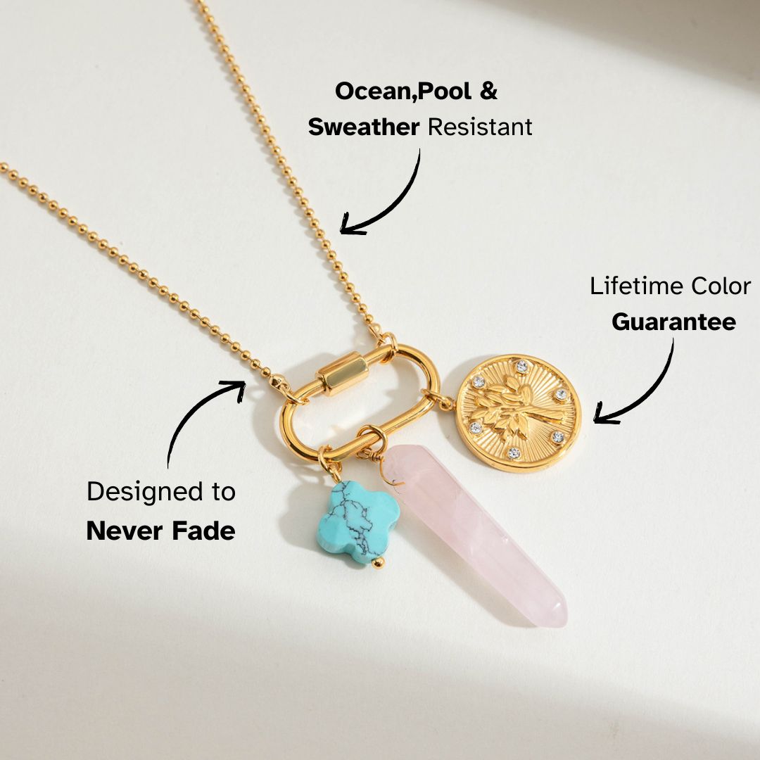 Close-up of waterproof gold necklace with rose quartz and turquoise charm
