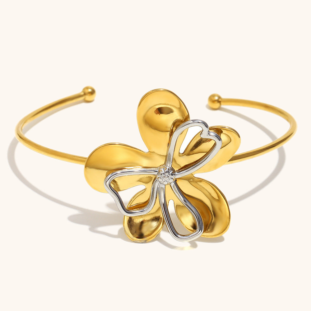 Stylish gold flower cuff bracelet with silver butterfly detail for women