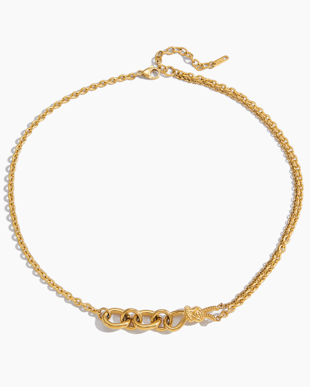 Gold chain necklace on a white background