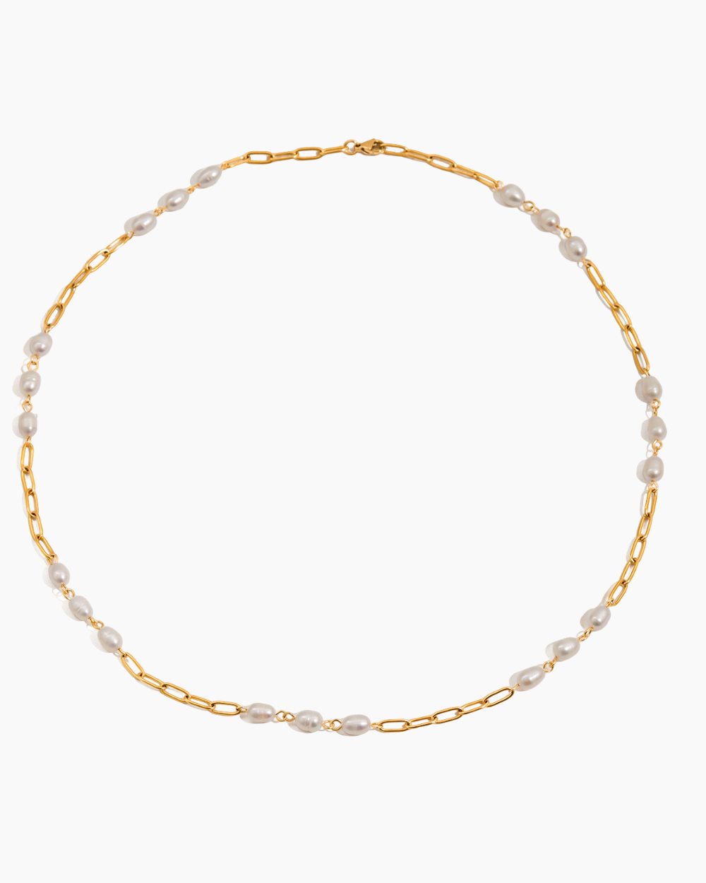 Gold chain necklace with pearls on a white background