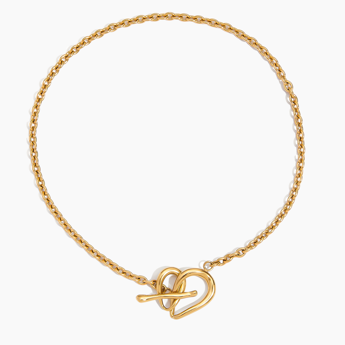 Gold bracelet with a heart-shaped clasp on a white background