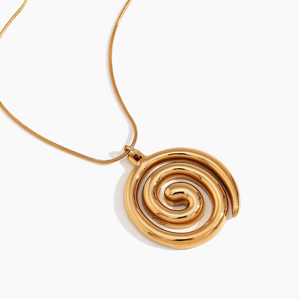 Gold spiral pendant necklace on a white background