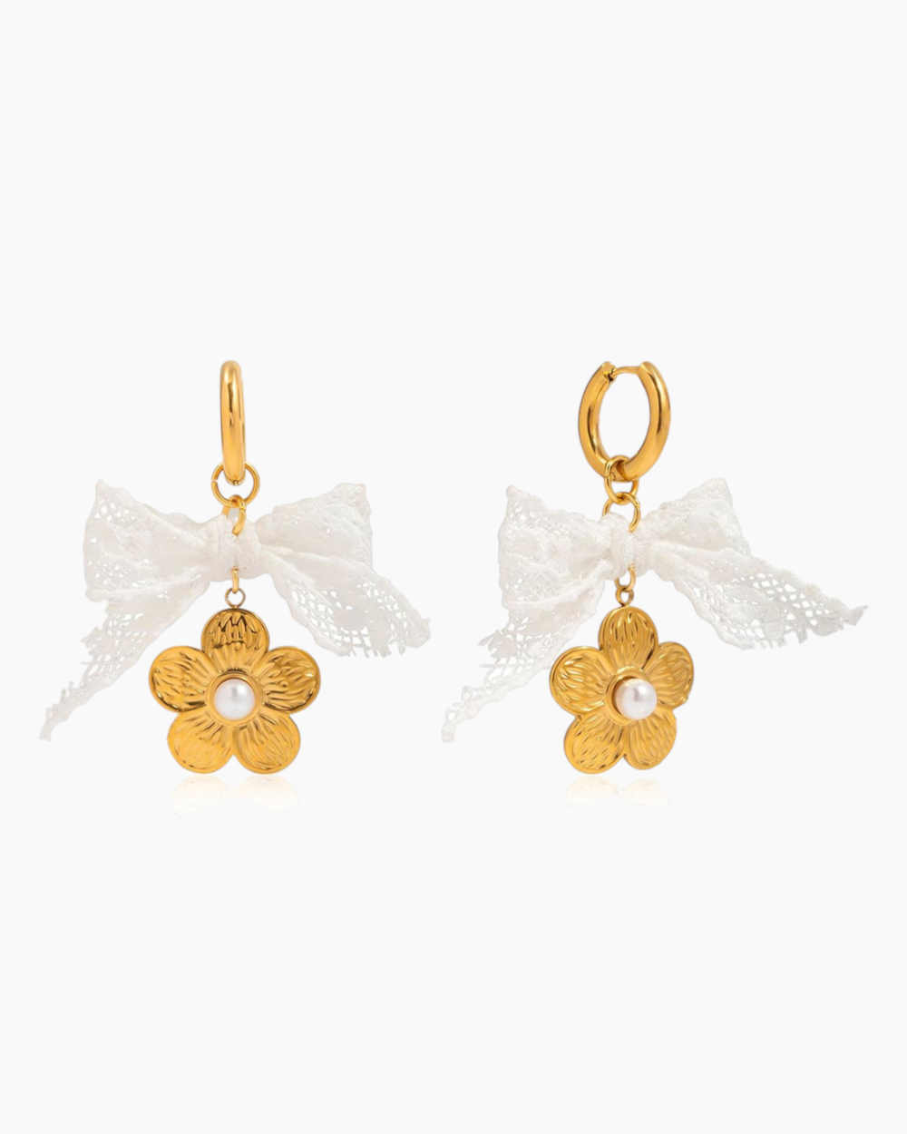Gold flower earrings with white ribbons on a white background