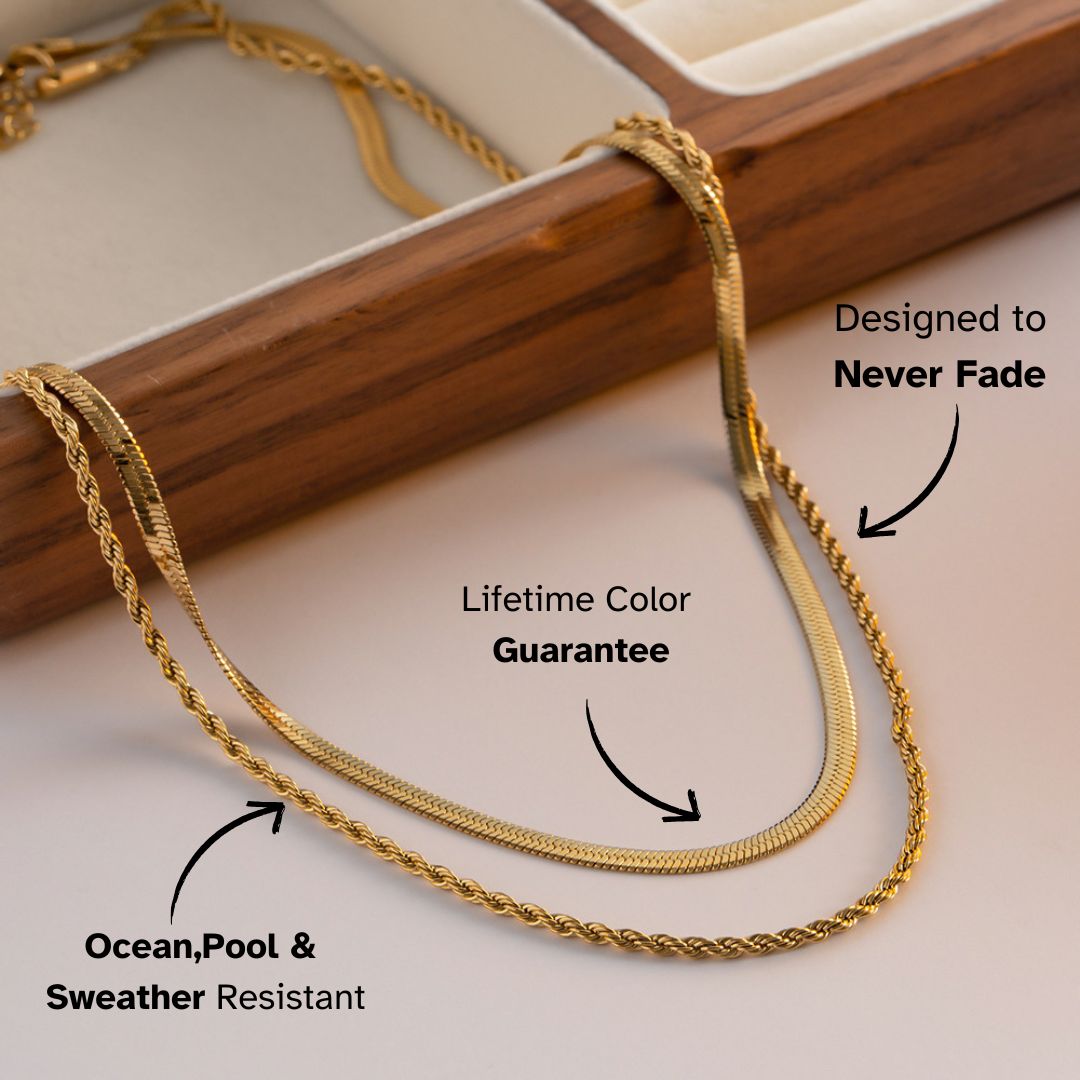 Triple-layer gold chain necklace styled over a jewelry box — elegant, sweatproof, loved by European minimalist trendsetters