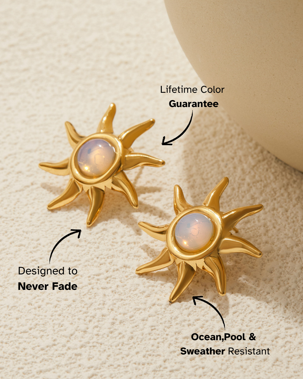 Gold sun-shaped earrings with text highlighting features on a beige background