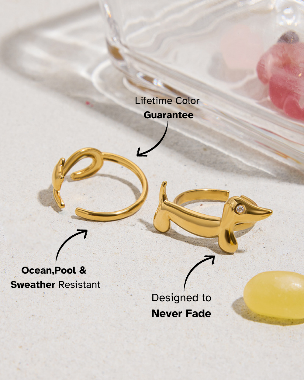 Gold dog-shaped ring on a white surface with text about product features.