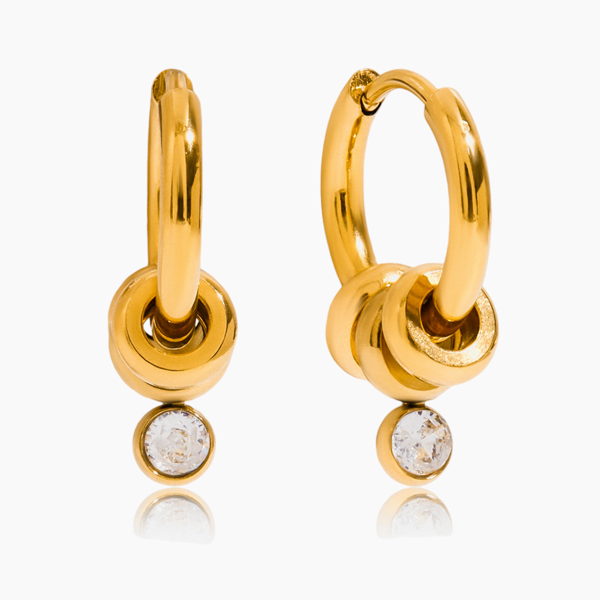 Gold hoop earrings with small round stones on a white background