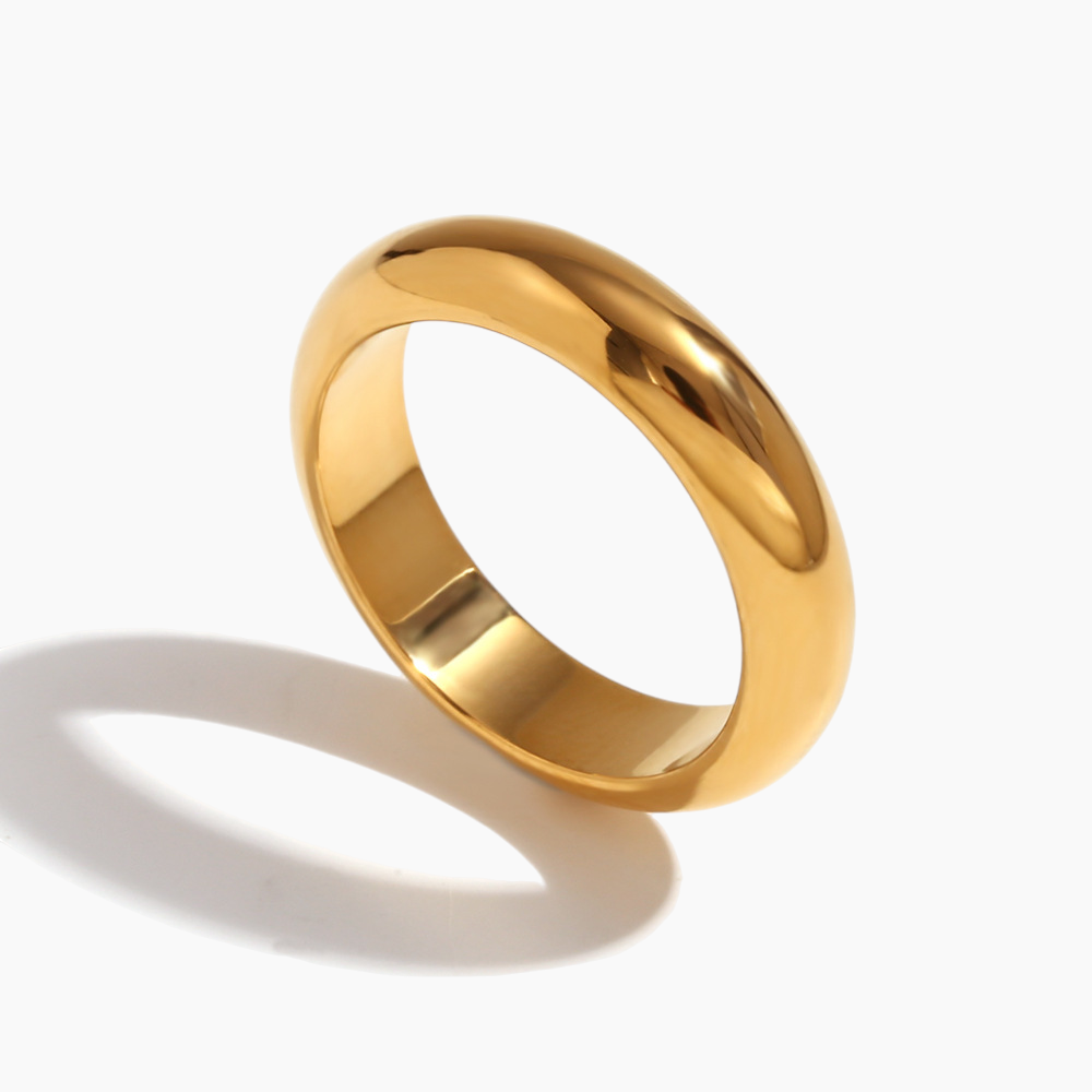 Gold ring on a white background