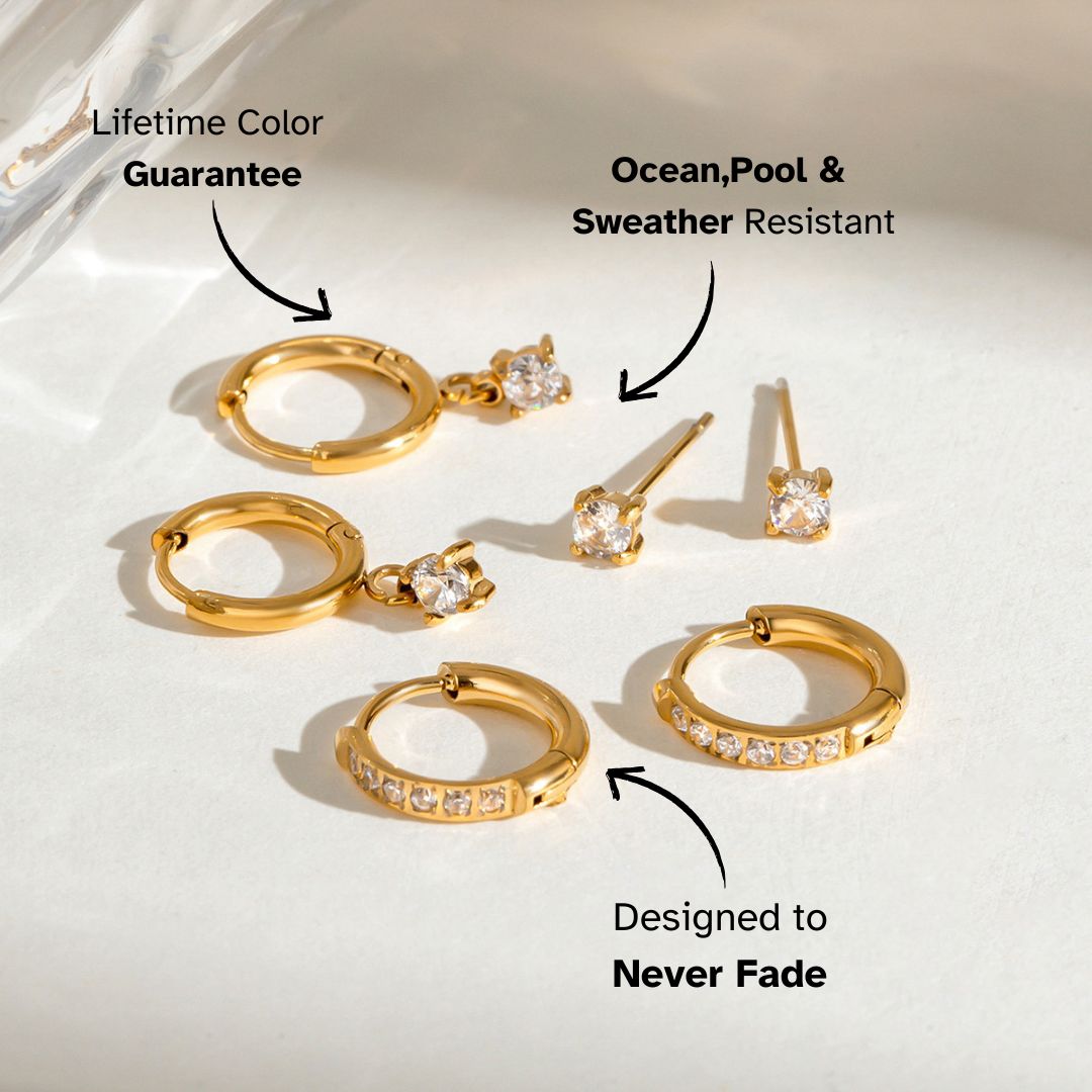 Delicate round zircon stud earrings set in gold prongs, perfect for second piercing stack.