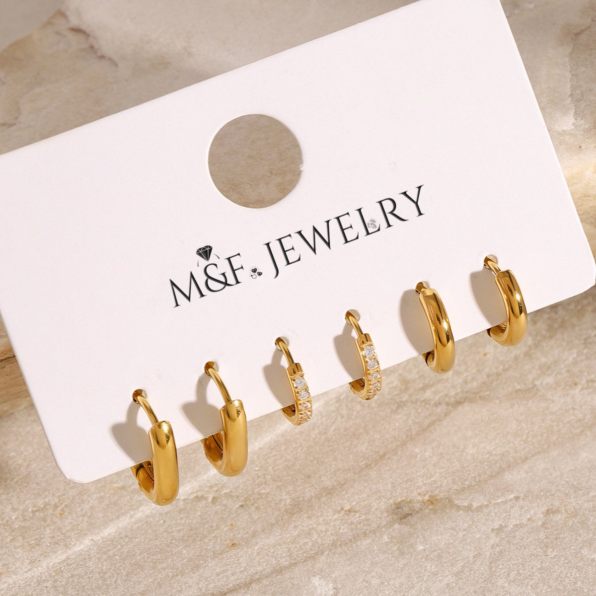 6-piece assorted gold huggie earrings with pavé and oval hoops