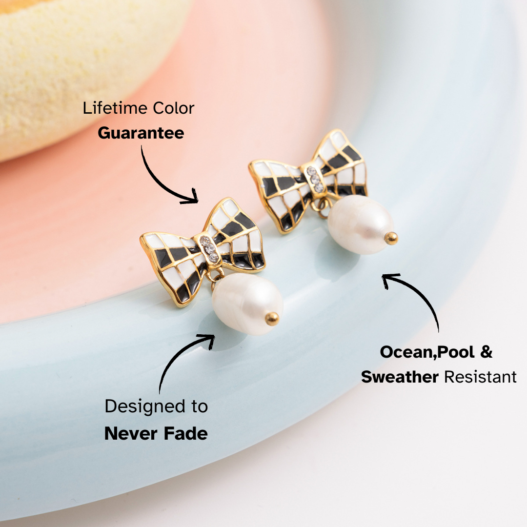 Bow-shaped earrings with pearl details on a light blue background, featuring text about color guarantee, resistance to ocean and pool water, and weather resistance.