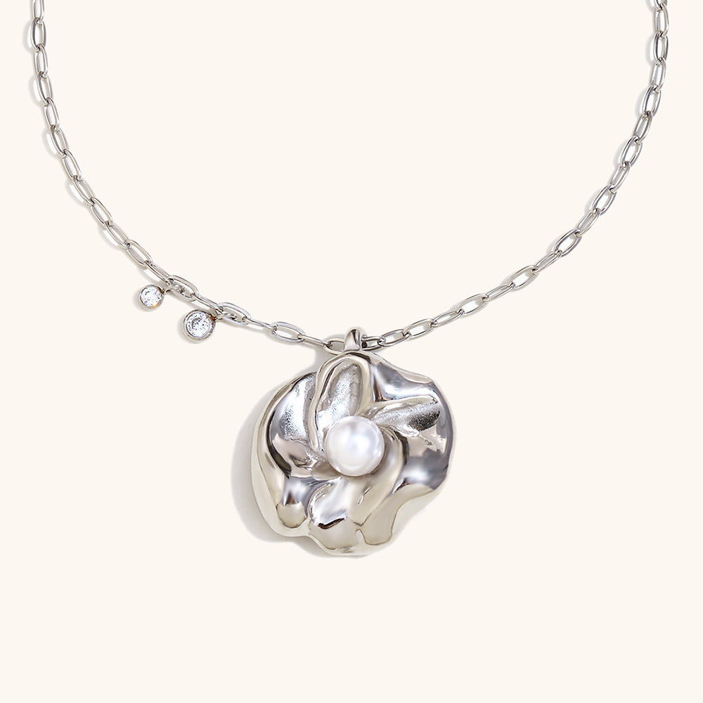 Silver floral pendant necklace with central pearl on minimalist chain
