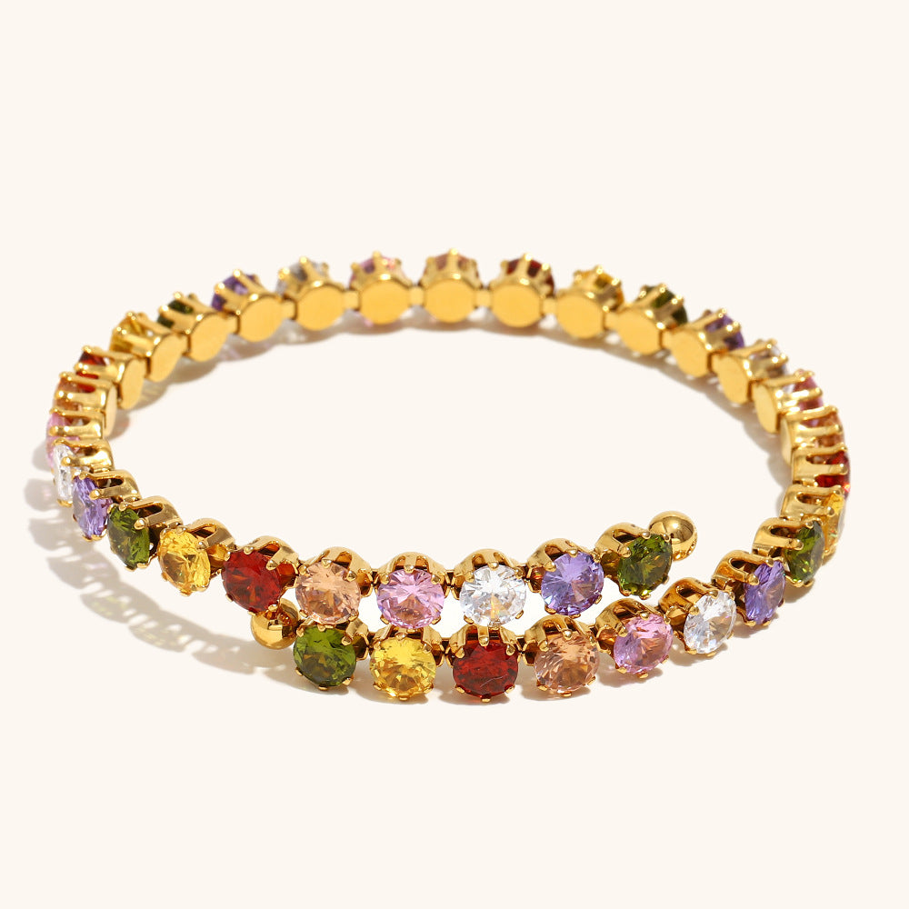Gold plated bracelet featuring rainbow cubic zirconia gemstones