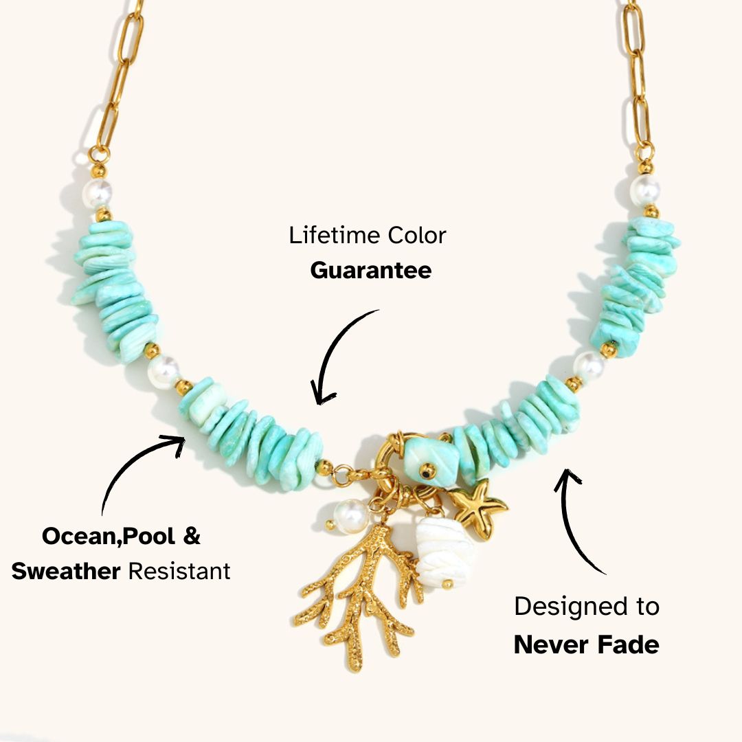 Turquoise shell necklace with ocean-themed charms and starfish detail