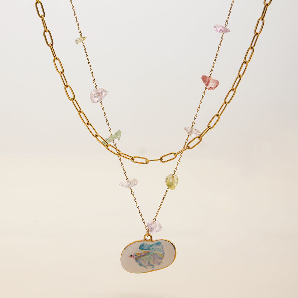 Summer necklace with colorful glass chips and enamel fish charm in gold setting
