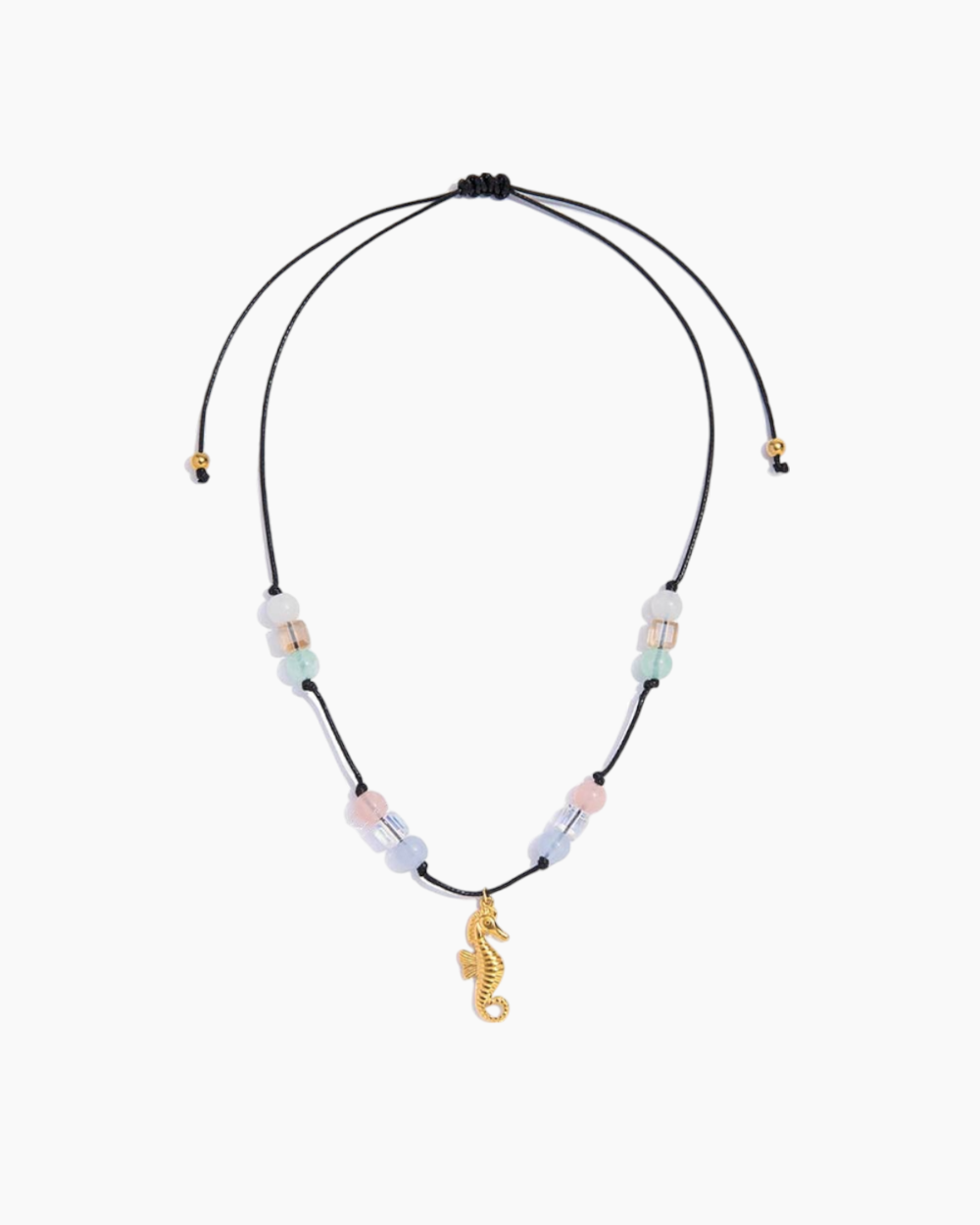 Necklace with seahorse charm and multicolored beads on a white background