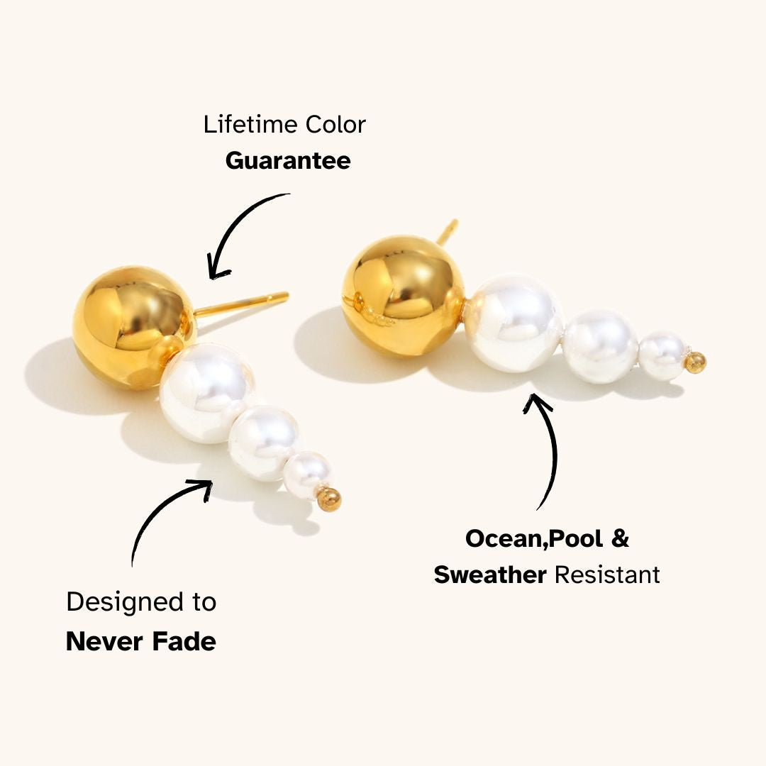 Gold and pearl drop earrings in tiered round bead design, ideal for ocean-loving fashionistas