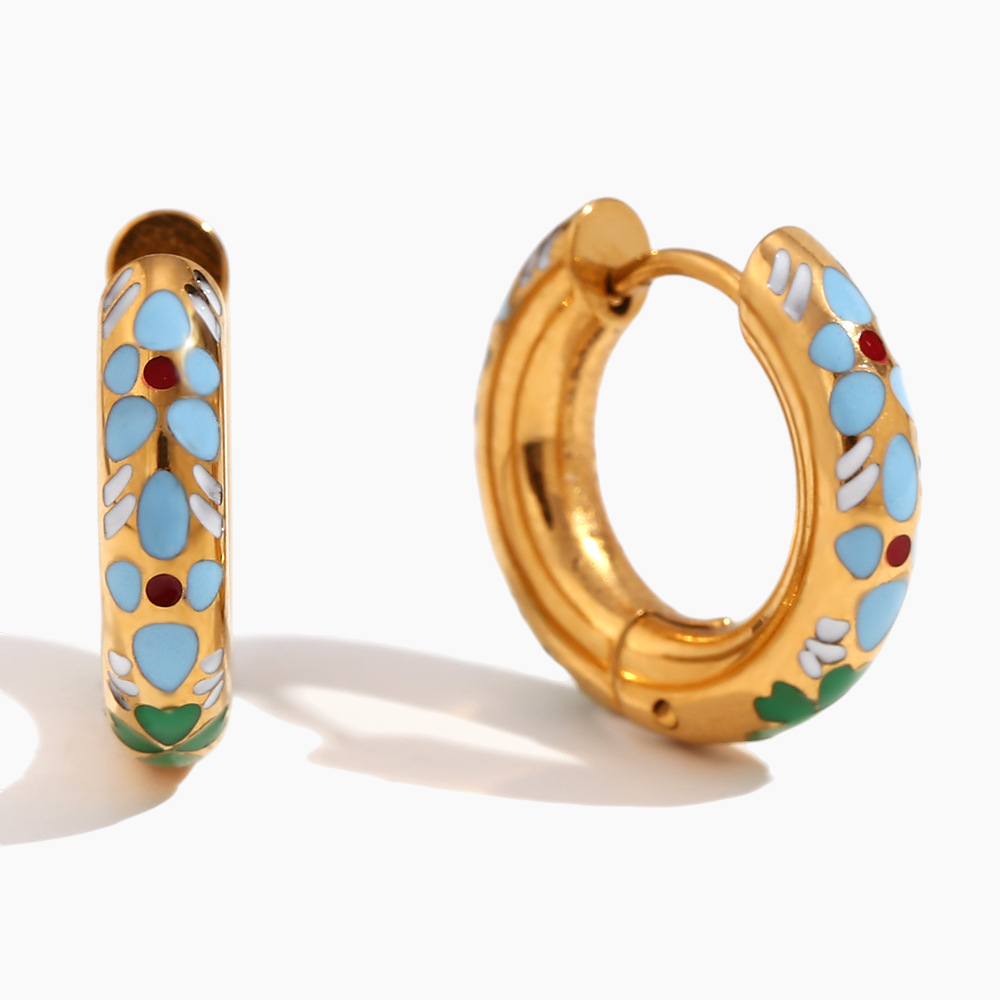 Gold hoop earrings with colorful enamel designs on a white background